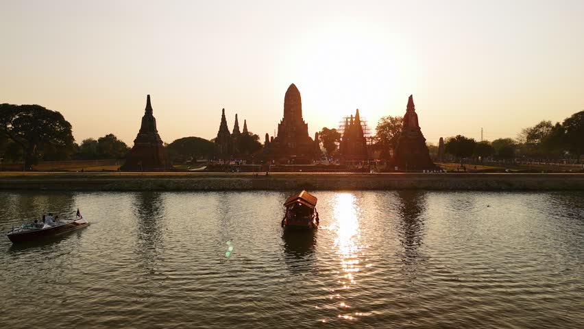 Aerial view of wat chaiwatthanaram temple at sunset in Ayutthaya historical park, Thailand. Unesco world heritage site. 
