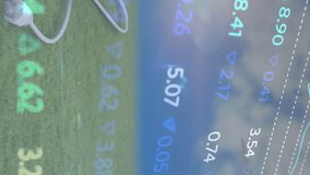 Animation of financial data processing over wind turbines and solar panel. global business, finances and digital interface concept digitally generated video. - Powered by Shutterstock - Get 15% off with code: PIKWIZARD15