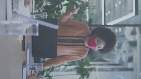 Animation of network of digital icons over team of diverse colleagues discussing together at office. Global networking and business technology concept - Powered by Shutterstock - Get 15% off with code: PIKWIZARD15