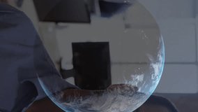 Animation of financial data processing over globe and businessman working in office. Global computing, finance, business and data processing concept digitally generated video. - Powered by Shutterstock - Get 15% off with code: PIKWIZARD15