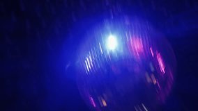 Spinning disco ball with purple lights - Powered by Shutterstock - Get 15% off with code: PIKWIZARD15