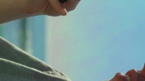 Animation of tech icons and metaverse city over hands of caucasian man using smartphone. Data processing and technology concept digitally generated video. - Powered by Shutterstock - Get 15% off with code: PIKWIZARD15