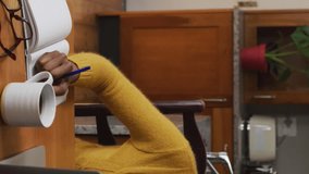 Animation of icons over businesswoman using laptop. Global social media connections and digital interface concept digitally generated video. - Powered by Shutterstock - Get 15% off with code: PIKWIZARD15