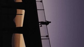 Animation of green shapes moving over man running on promenade. Technology, sport and digital interface concept digitally generated video. - Powered by Shutterstock - Get 15% off with code: PIKWIZARD15