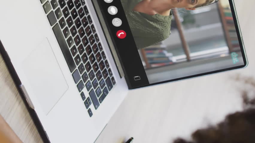 Animation of financial data processing over diverse business people on laptop video call. Global finance, business, connections, computing and data processing concept digitally generated video. - Powered by Shutterstock - Get 15% off with code: PIKWIZARD15