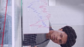 Animation of numbers and data processing over diverse couple using laptop in shop. Global shopping, business, finance, computing and data processing concept digitally generated video. - Powered by Shutterstock - Get 15% off with code: PIKWIZARD15