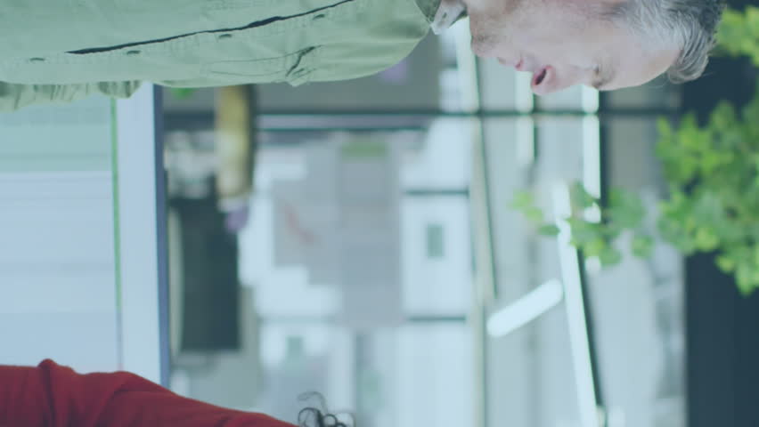 Animation of data processing over diverse business people working at office. Global business and digital interface concept digitally generated video. - Powered by Shutterstock - Get 15% off with code: PIKWIZARD15