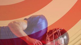 Animation of caucasian american football player and flag of usa. American patriotism, sports and competition concept digitally generated video. - Powered by Shutterstock - Get 15% off with code: PIKWIZARD15