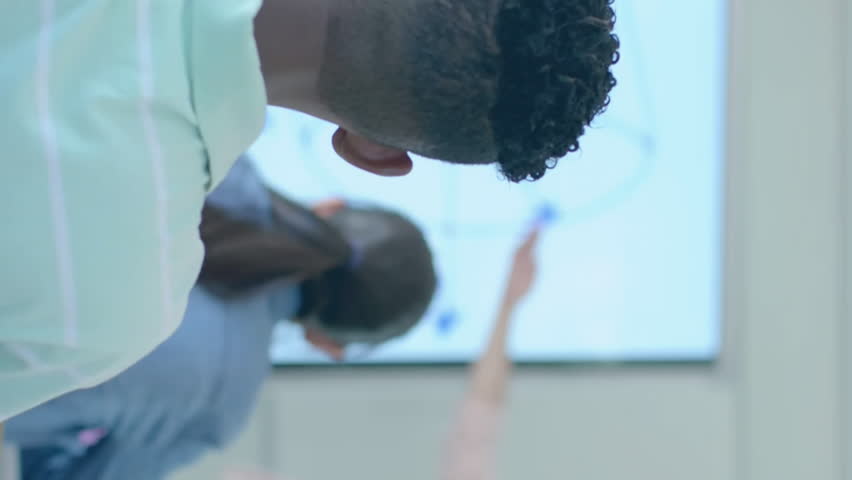 Animation of ai data processing over diverse students at school. Artificial intelligence, education, connections, computing and data processing concept digitally generated video. - Powered by Shutterstock - Get 15% off with code: PIKWIZARD15