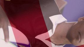 Animation of flag of england over diverse male rugby players at pitch. Sport, patriotism and digital interface concept digitally generated video. - Powered by Shutterstock - Get 15% off with code: PIKWIZARD15