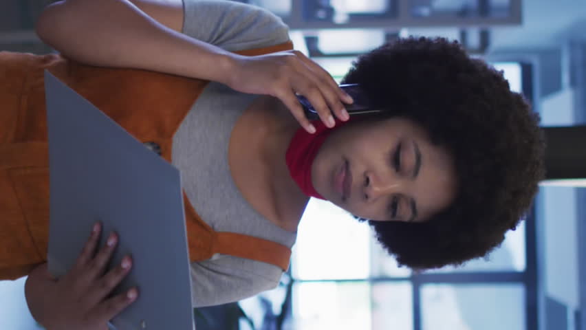 Animation of speech bubbles over african american businesswoman talking on smartphone. global networks, business, data processing and digital interface concept digitally generated video. - Powered by Shutterstock - Get 15% off with code: PIKWIZARD15