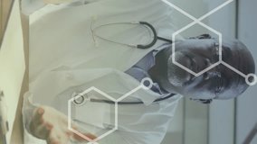 Animation of chemical formulas over african american doctor. Global business, finances, data processing and digital interface concept digitally generated video. - Powered by Shutterstock - Get 15% off with code: PIKWIZARD15
