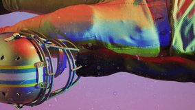 Animation of data processing over african american football player. Sports, competition, data processing and communication concept digitally generated video. - Powered by Shutterstock - Get 15% off with code: PIKWIZARD15