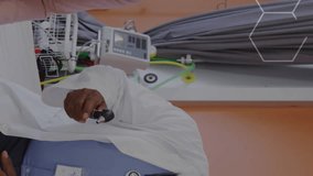 Animation of dna strand over african american male doctor with female patient. Global medicine, healthcare, digital interface, computing and data processing concept digitally generated video. - Powered by Shutterstock - Get 15% off with code: PIKWIZARD15