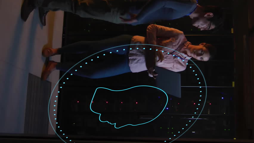 Animation of ai scanner, brain and chat icons over diverse technicians in dark server room. Data, digital interface, connection, communication and artificial intelligence, digitally generated video. - Powered by Shutterstock - Get 15% off with code: PIKWIZARD15