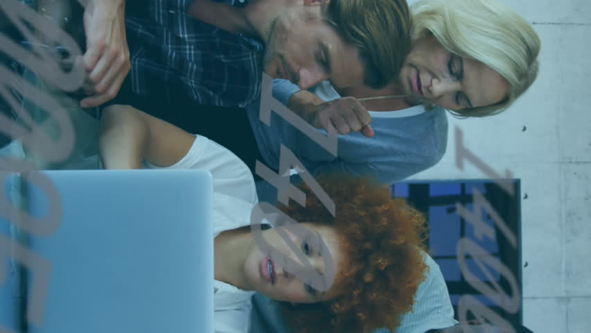 Animation of numbers changing over team of people using laptop. digital interface global connection and finance concept digitally generated video. - Powered by Shutterstock - Get 15% off with code: PIKWIZARD15