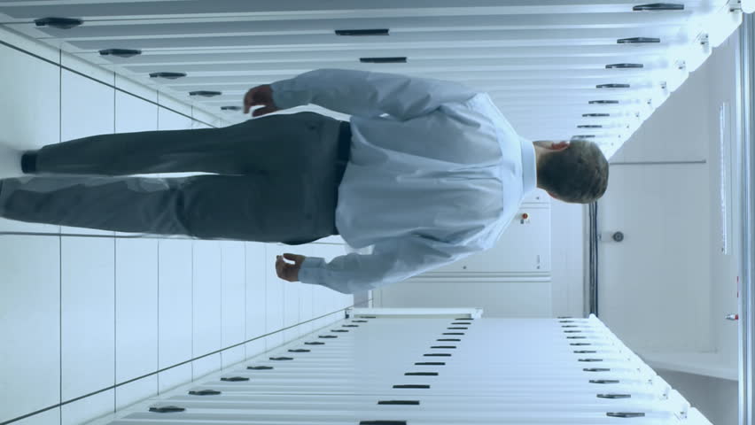 Animation of data processing over world map against caucasian male engineer walking in server room. Computer interface and business data storage technology concept - Powered by Shutterstock - Get 15% off with code: PIKWIZARD15