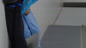 Animation of heart rate over diverse male female doctors discussing sitting on floor at hospital. Medical healthcare and research science technology concept - Powered by Shutterstock - Get 15% off with code: PIKWIZARD15