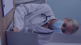 Animation of data processing over caucasian female doctor using laptop. Global medicine, finances, computing and digital interface concept digitally generated video. - Powered by Shutterstock - Get 15% off with code: PIKWIZARD15