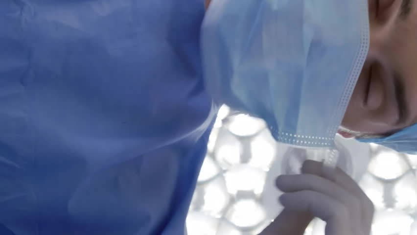 Animation of data processing over caucasian male surgeon wearing face mask. Global medicine and digital interface concept digitally generated video. - Powered by Shutterstock - Get 15% off with code: PIKWIZARD15