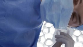 Animation of data processing over caucasian male surgeon wearing face mask. Global medicine and digital interface concept digitally generated video. - Powered by Shutterstock - Get 15% off with code: PIKWIZARD15