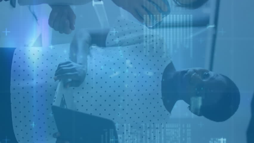 Animation of data processing over diverse business people using tablet. Medical research and digital interface technology digitally generated video. - Powered by Shutterstock - Get 15% off with code: PIKWIZARD15