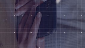 Animation of statistics and financial data processing over caucasian man using smartphone. Global business, connections, networks and data processing concept digitally generated video. - Powered by Shutterstock - Get 15% off with code: PIKWIZARD15