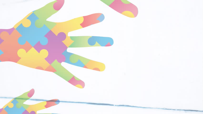 Animation of hands with colourful puzzle pieces and world map. autism, learning difficulties, support and awareness concept digitally generated video. - Powered by Shutterstock - Get 15% off with code: PIKWIZARD15