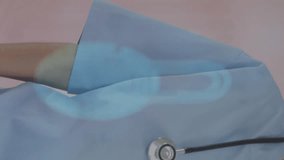 Composition of smiling businessman touching interactive screen with lightbulbs and binary coding processing. Medical healthcare and technology concept. - Powered by Shutterstock - Get 15% off with code: PIKWIZARD15