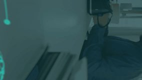 Animation of brain and medical data processing on interface, over man using vr headset. global medical research technology and digital interface concept, digitally generated video. - Powered by Shutterstock - Get 15% off with code: PIKWIZARD15