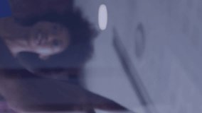 Animation of binary coding over diverse colleagues discussing work in office. Global business, teamwork and digital interface concept digitally generated video. - Powered by Shutterstock - Get 15% off with code: PIKWIZARD15