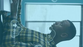 Animation of clouds with percent growing over african american businessman in office. Global finance, business, connections, cloud computing and data processing concept digitally generated video. - Powered by Shutterstock - Get 15% off with code: PIKWIZARD15