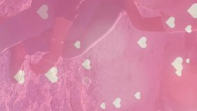 Animation of hearts falling over diverse couple. Global lifestyle, free time and digital interface concept digitally generated video. - Powered by Shutterstock - Get 15% off with code: PIKWIZARD15