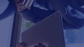 Animation of icons and data processing over diverse business people using tablet. Global social media, business, connections, computing and data processing concept digitally generated video. - Powered by Shutterstock - Get 15% off with code: PIKWIZARD15