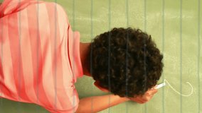 Animation of school icons over afican american schoolboy writing on chalkboard. Global education, learning, connections, computing and data processing concept digitally generated video. - Powered by Shutterstock - Get 15% off with code: PIKWIZARD15