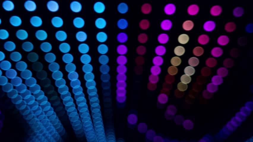 Defocused colorful LED lights at the night club, abstract background