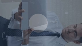 Animation of network of connections with icons over businessman using laptop. Global connections, business, finance, computing and data processing concept digitally generated video. - Powered by Shutterstock - Get 15% off with code: PIKWIZARD15