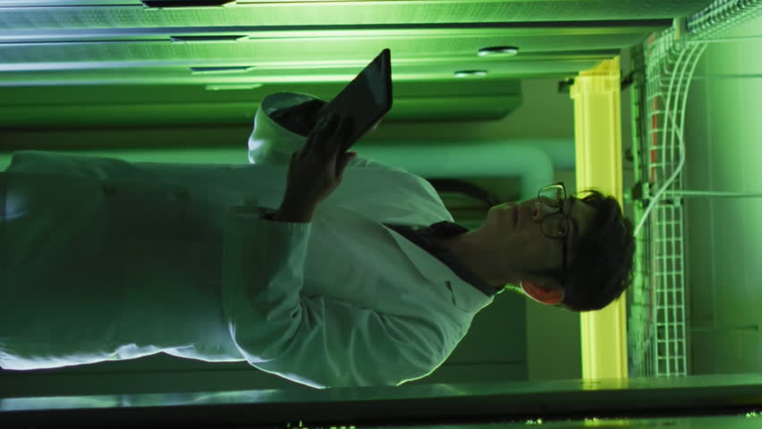 Animation of social media icons over asian male engineer using digital tablet at server room. Social media networking and business data storage technology concept - Powered by Shutterstock - Get 15% off with code: PIKWIZARD15