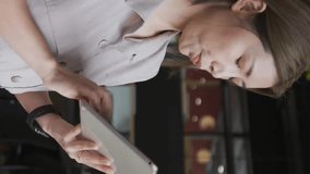 Animation of financial data processing over asian businesswoman using tablet in office. Global finance, business, connections, computing and data processing concept digitally generated video. - Powered by Shutterstock - Get 15% off with code: PIKWIZARD15