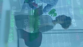 Animation of financial data processing over diverse business people in office. Global finance, business, connections, computing and data processing concept digitally generated video. - Powered by Shutterstock - Get 15% off with code: PIKWIZARD15