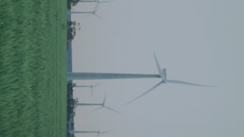 Wind turbines in field with data processing animation over landscape. Renewable, energy, technology, sustainable, windmill, power - Powered by Shutterstock - Get 15% off with code: PIKWIZARD15