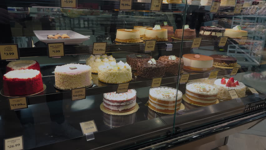 Delicious sweets cakes in store. Showcase of store