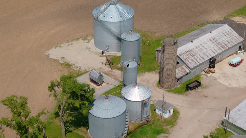 Drone shot of Countryside Fields and farm. Spring time
