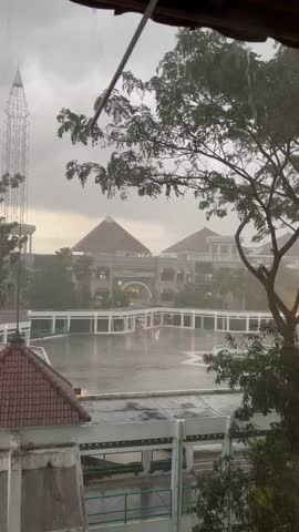 Rainy Day on Campus: University Buildings Under a Cloudy Sky