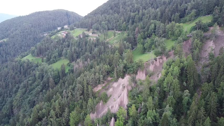 Beautiful landscape showing a small town in the italian Dolomites with a cloudy sky, Collalbo, South Tyrol, Italy