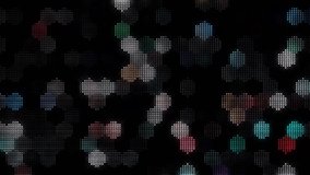 Detailed macro view of illuminated LED matrix with vivid red, green, and orange lights. Perfect for visual media and modern tech visuals. - Powered by Shutterstock - Get 15% off with code: PIKWIZARD15