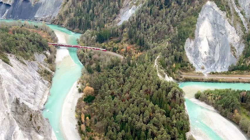Magnificent view of the Rhine Gorge, also known as the Ruinaulta or “Swiss Grand Canyon”, from the “Il Spir” point near Flims. The Rhaetian Railway line from Chur to Illanz runs through the gorge.