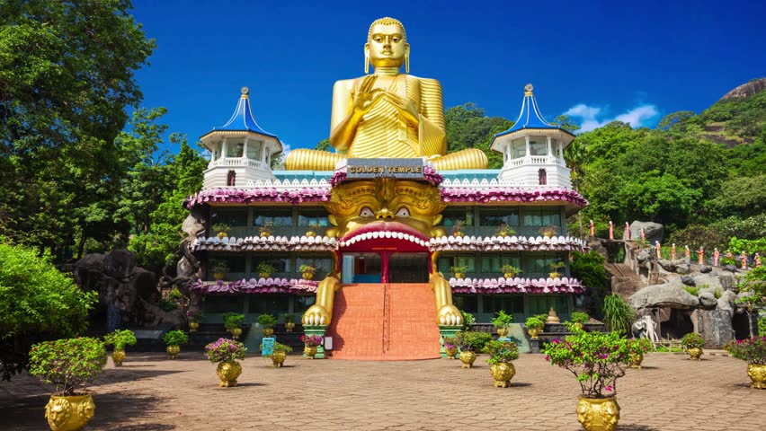 Huge golden Buddha statue on top of the Museum of the Golden Temple Dambulla Golden Temple of Dambulla or Dambulla Cave Temple is a World Heritage Site near Dambulla, Sri Lanka Golden Temple of Dambul