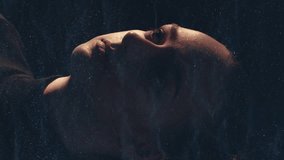 Vertical video. Dust pollution. Ecology problem. Double exposure silhouette of sick woman coughing wearing face mask on dark abstract night sky with floating glitter particles. - Powered by Shutterstock - Get 15% off with code: PIKWIZARD15