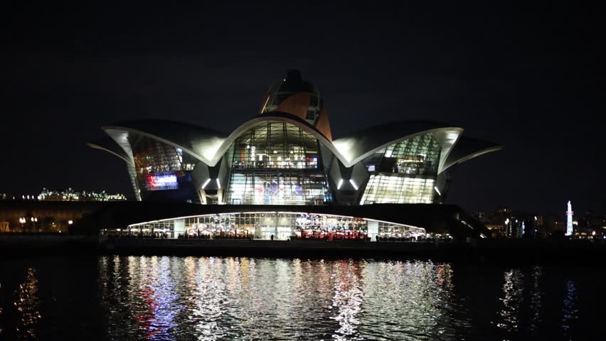 A beautifully lit shopping center on the seaside